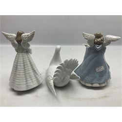 Four Lladro figures, comprising Angelic Cymbalist no 5876, Angel Tree Topper no 5875, Peaceful Dove no 6289 and First Christmas together no 5923, together with two Lladro Christmas Balls 1988, all with original boxes, largest example H18cm 