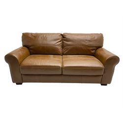 Two seat sofa, upholstered in tan leather