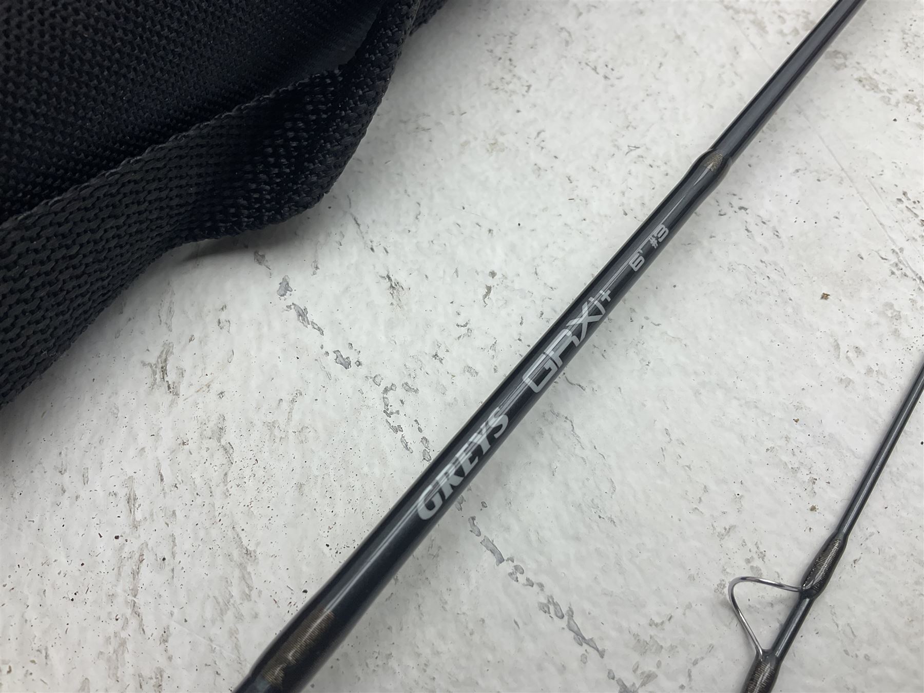 Five fly fishing rods, to include Greys Greyflex M2, Greys Missionary 9'3 etc, together with fly reel, flies, Wychwood fishing bag and various fishing other tackle items 