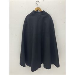 Police Constabulary style uniform items comprising woollen night cape / cloak with chain fastening, helmet and truncheon