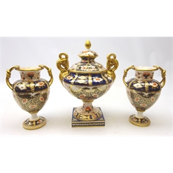  Mid Victorian Davenport pot pourri vase and cover (1870-86) decorated in the Imari pattern, with two gilt ram head handles, H29cm with pair Victorian matched vases by J. B & Son, H20cm (3)  