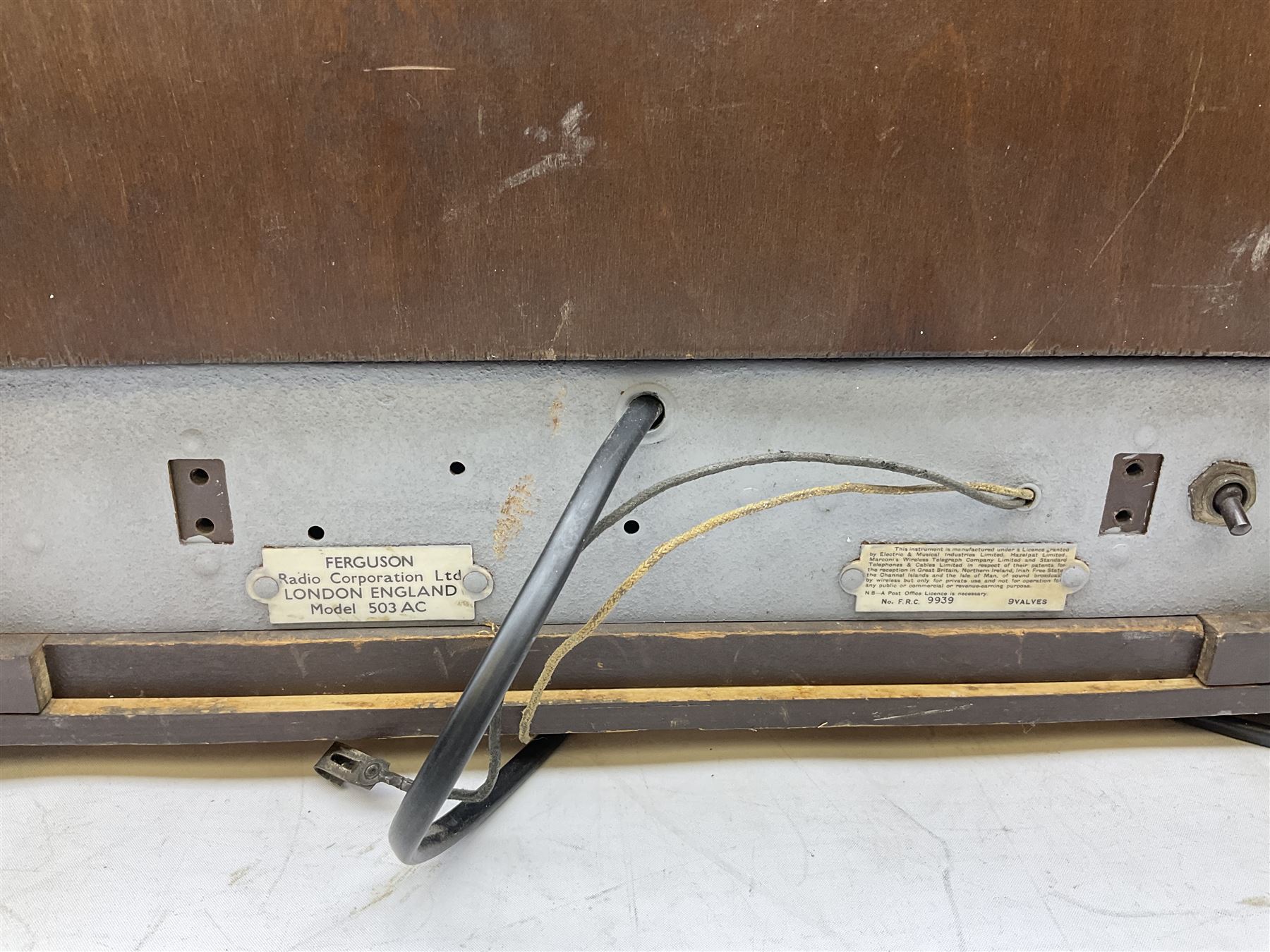 Late 1930s Art Deco Ferguson 503AC walnut cased valve radio, with glazed oval dial above four Bakelite knobs, H55cm D28cm W42cm