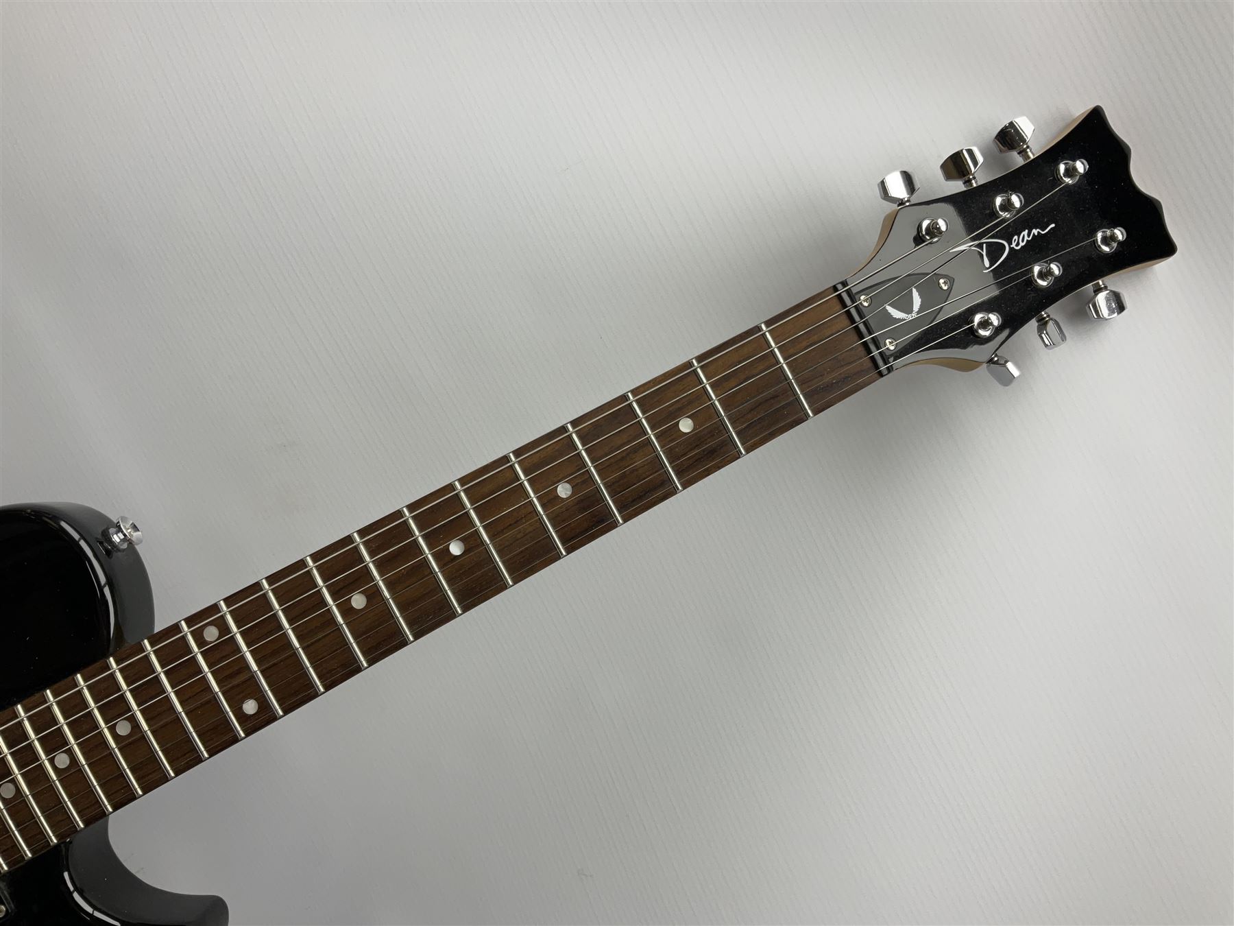 Dean small or child's size electric guitar in black, serial no.O09121956 L85cm; in gig bag; and modern student's violin with 35.5cm two-piece back in fitted carrying case with older bow (2)