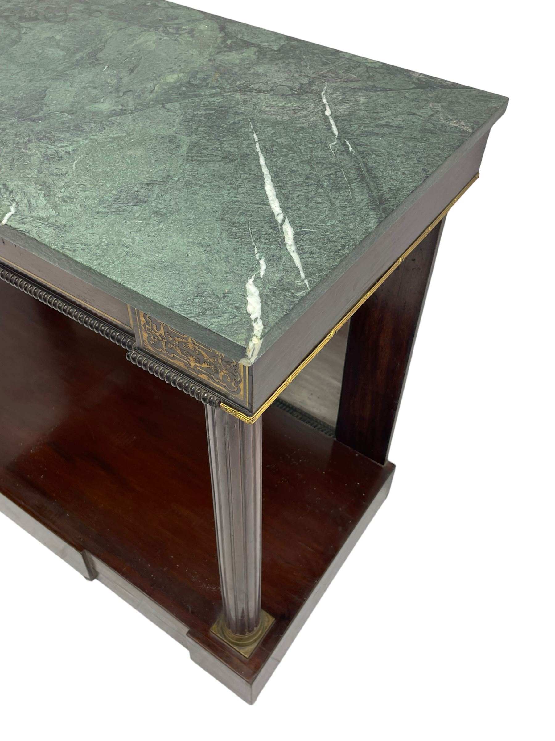 Late 19th century mahogany console or pier table, rectangular green marble top over a break-front frieze inlaid with brass scroll work panels, reed and ribbon gilt metal and wooden beaded applied mouldings, on turned and fluted front supports, plain mirror back over plinth platform base