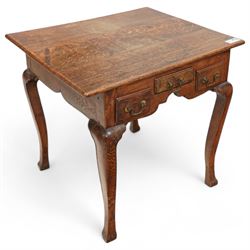 18th century country oak low-boy, deep rectangular top over three small drawers and shaped apron, on angular cabriole supports