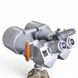 Pair of mid 20th century Russian Helios PNB-2 military observation binoculars, no. 40149, each 'Big Eye' lens 13cm in diameter, with 80 degrees vertical elevation, 360 degrees rotation, spirit level to centre of body, contained in wooden stow case with service manual, canvas cover, two lens caps, a small latched metal tin containing lenses and accessories and on adjustable wooden tripod painted green with pointed feet,  with a small latched metal tin containing eight lenses and accessories