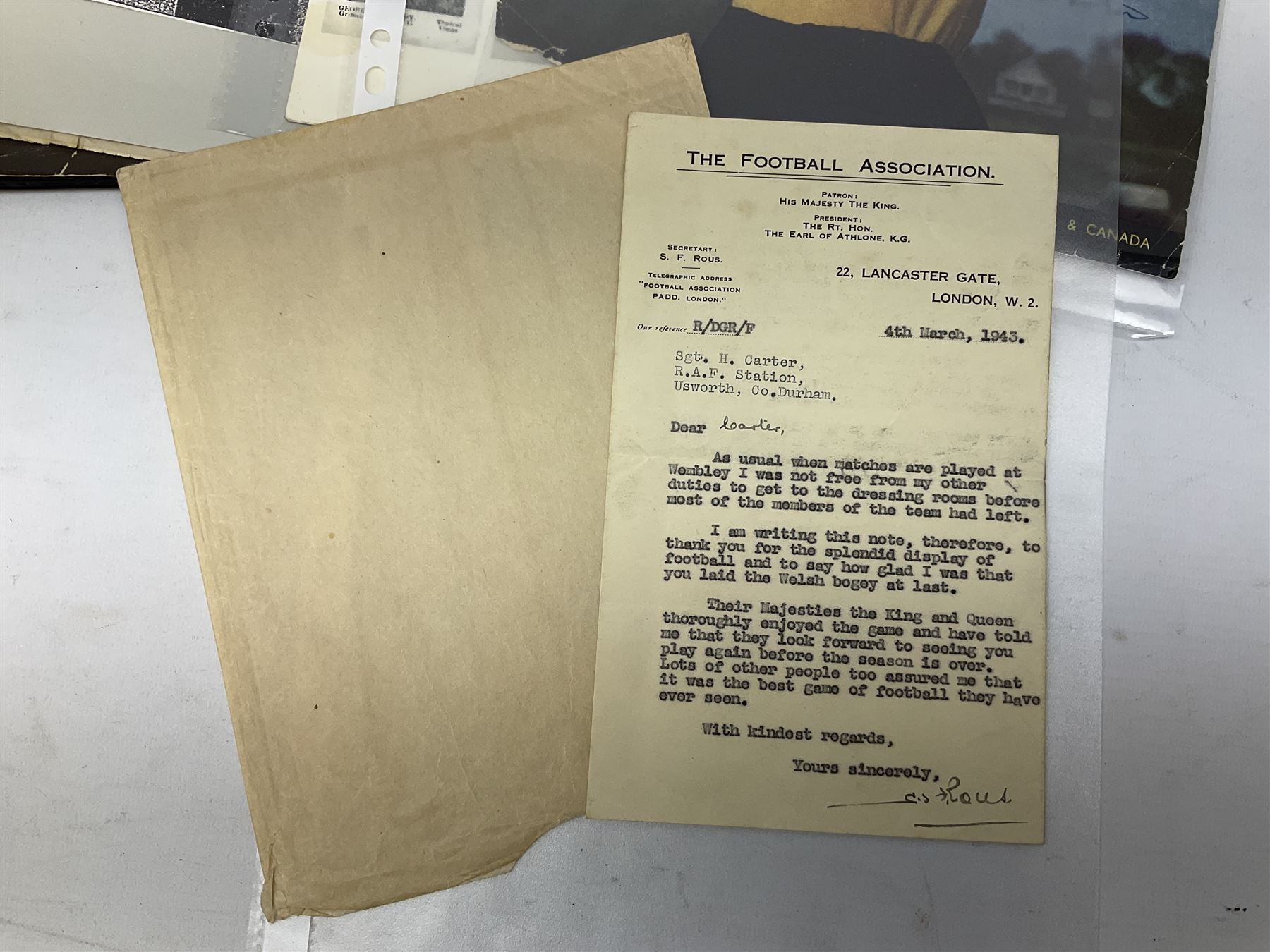 Raich Carter interest - scrap book of a series of articles on his life story for 'Answers' Aug - Oct 1949; scrap book of a proof set of cartoon strips for the Daily Express entitled 'The Raich Carter Story' with accompanying letter dated Dec 1963; photograph of Carter as the only English Schoolboy International to play for two years; photograph of Carter shaking hands with George VI before an England International; two photographs of the '100 years of the FA Cup' match at Wembley; and other paper ephemera. Provenance: By direct descent from the family of Raich Carter having been consigned by his daughter Jane Carter.