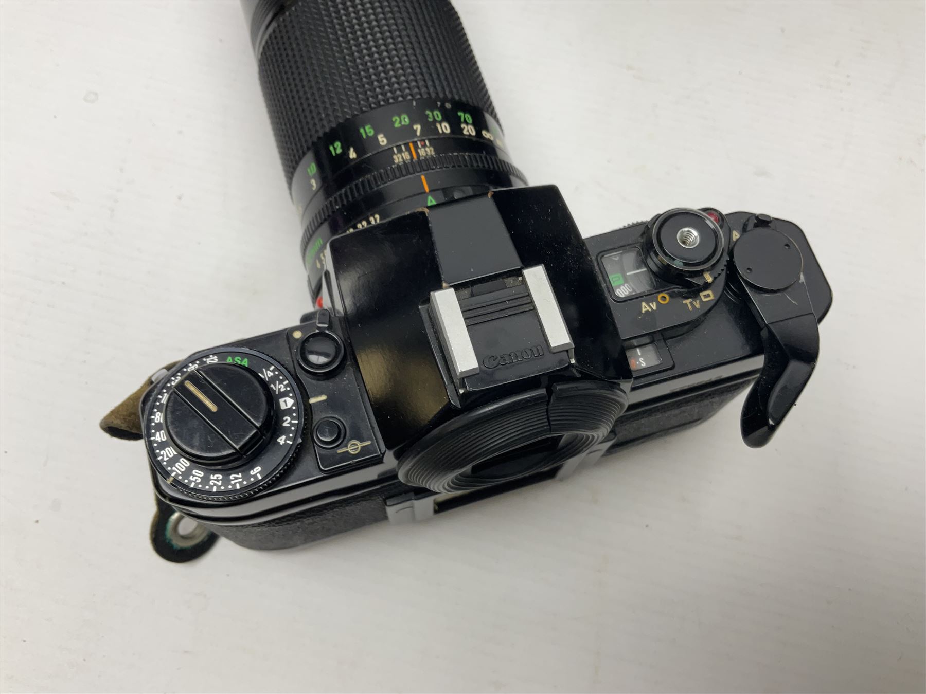 Canon A1 camera body, serial no 775843, together with 'Canon Lens FD 200mm 1:4 lens' serial no 24432, together with Semi Minolta folding camera, Canon 'Zoom FD 35-105mm 1:3.5-4.5' lens, Canon 'Macro Focusing Zoom 72mm Hanimex HMC 28-200mm' lens and other camera equipment  