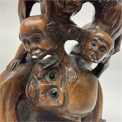 Chinese root carving, modelled as a large monkey family, with inset eyes, H25cm