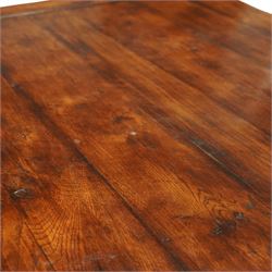 Country House 12' oak and fruitwood refectory dining table, the substantial rectangular plank top with cleated ends and chamfered edge, raised on twin trestle end square tapering and turned baluster supports with sledge feet and chamfered united by a long stretcher rail