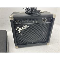 Fender style sunburst electric guitar with manuscript mark 'Zenta Stratocaster 1963' L97cm; in hard carrying case; another similar unmarked sunburst electric guitar; in gig bag; and Fender Frontman Amplifier, serial no.M473406 (3)