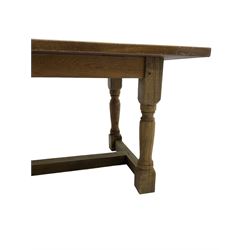 Large 20th century oak refectory dining table, on turned supports joined by H-frame stretchers