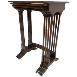 20th century inlaid mahogany quartetto nest of four tables, rectangular top inlaid with birdseye maple oval panel, ring turned supports on sledge feet