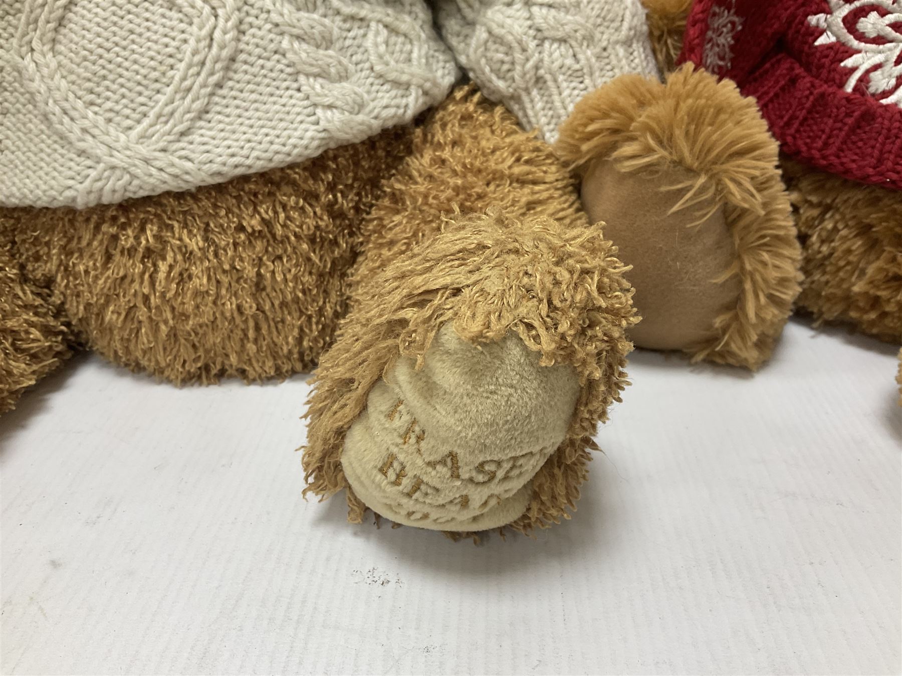 Eight annual Fraser Bears, by House of Fraser, dating between 2004 and 2011, tallest H46cm