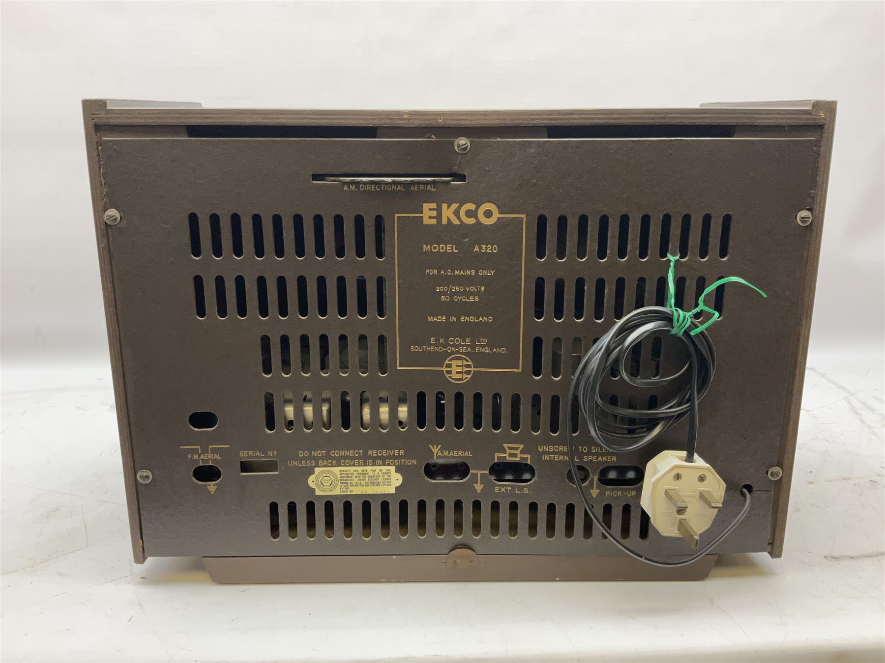 1955 Pye Fenman II valve radio in walnut veneered case, W58cm, together with a 1950s McMichael Type 854 valve radio with Bakelite knobs, W47cm H39cm D24cm, and 1957 Ekco Type A320 radio in dark walnut veneered case (3)