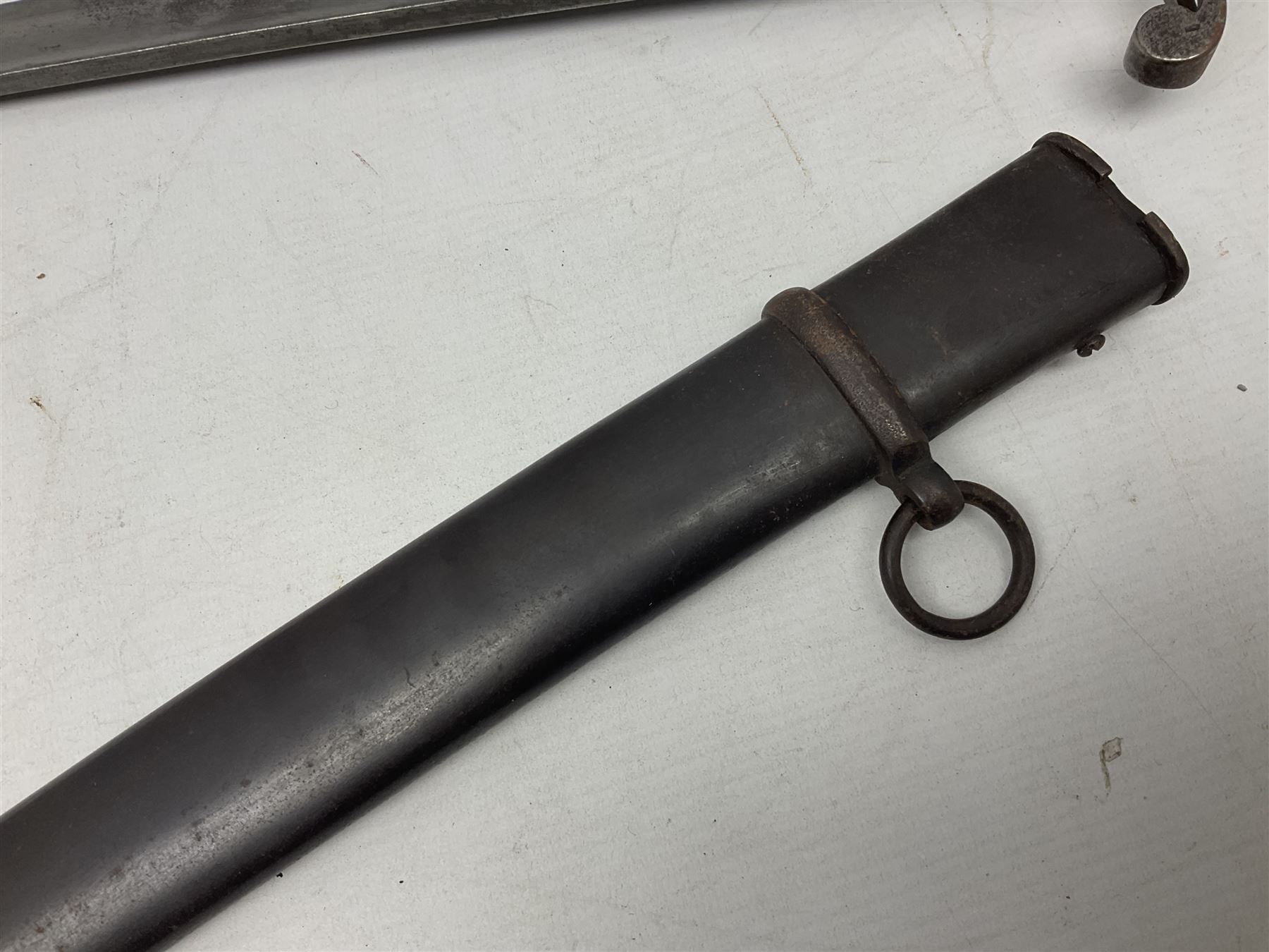 Italian M1833 Sabre with slightly curving 79cm fullered steel blade, the plain steel hilt with 'D' shaped knuckle bow, langets and wire-bound leather grip; in steel scabbard with single hanging ring L101cm overall