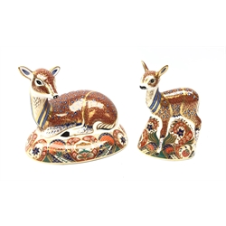  Two Royal Crown Derby Deer and Fawn paperweights, designed exclusively for the Royal Crown Derby Collectors Guild, gold stoppers, L16.5cm max (2)  
