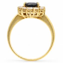 18ct gold sapphire and diamond cluster ring, single oval cut sapphire of approx 1.05 carat, surrounded by twelve round brilliant cut diamonds, stamped 750, total diamond weight approx 0.25 carat