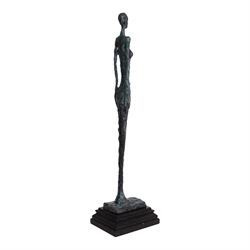 After Alberto Giacometti - Femme Venise bronze upon a stepped marble base, overall H50cm