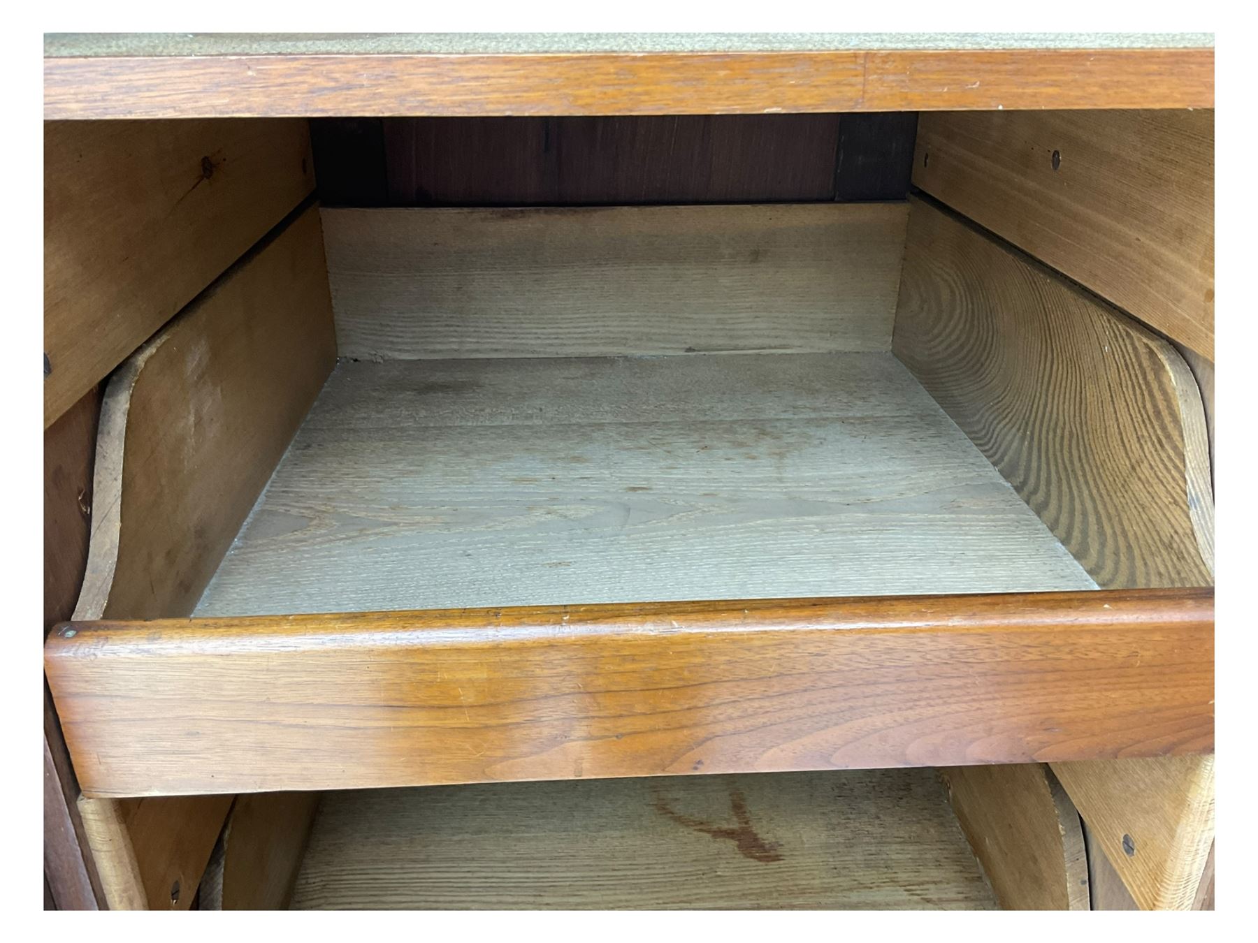 Late Victorian walnut triple combination wardrobe, projecting moulded and dentil cornice, central shaped bevelled mirror glazed door, cartouche and curled leaf carved panels over figured walnut veneered panels, fitted with drawer to base, on bracket feet