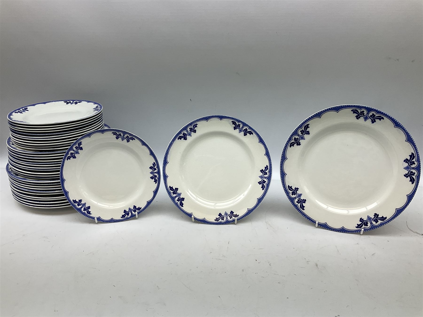 Burgess and Leigh Middleport pottery dinner wares decorated in the ‘Milford’ pattern, to include lidded tureens, graduated meat plates, dinner plates etc 