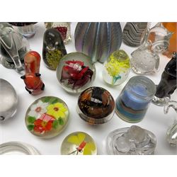 Robert Held iridescent art glass sea urchin paperweight, signed to underside, together with Murano glass clown and a collection of other glass paperweights and animals, etc 