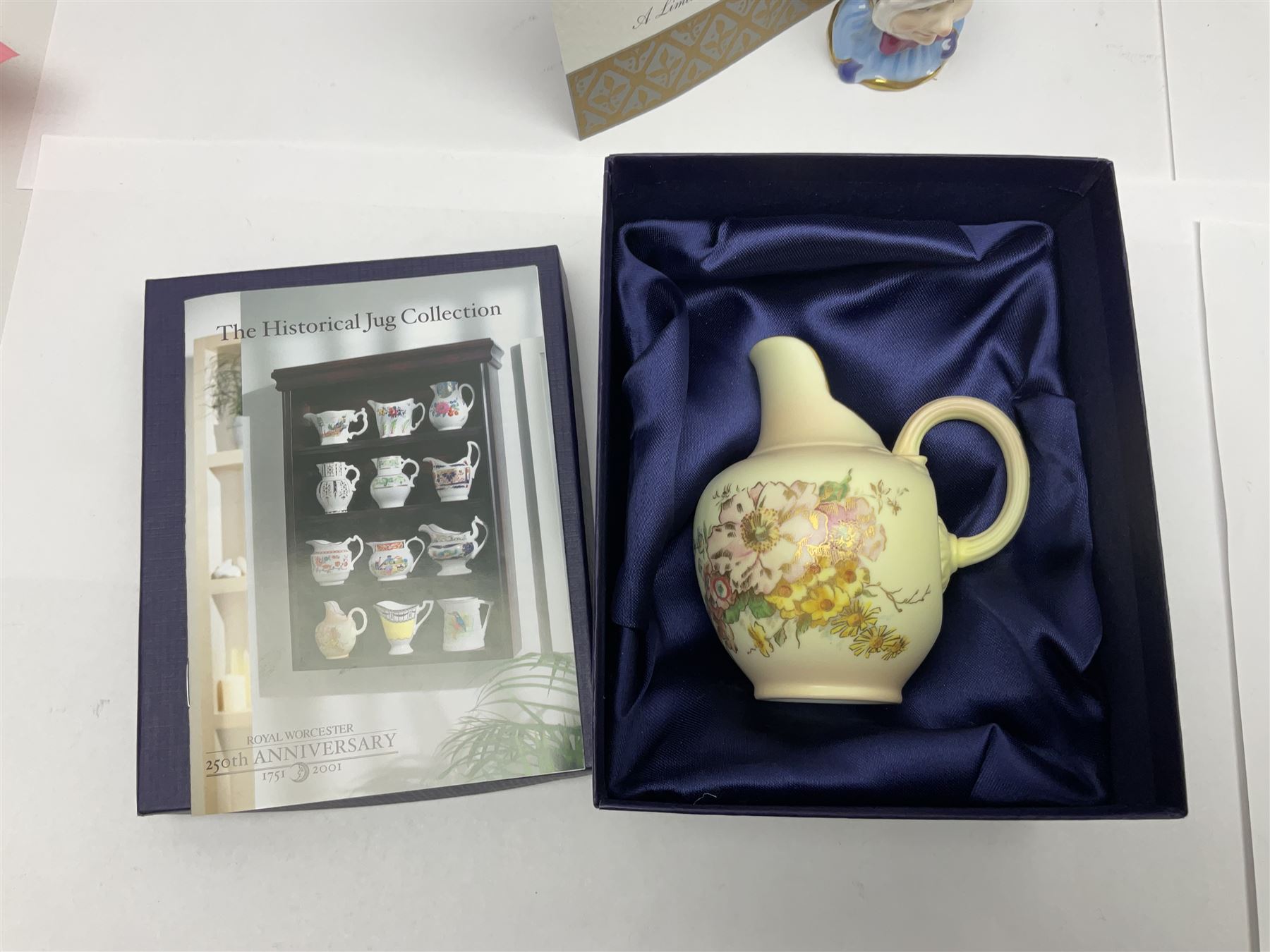 Two Royal Worcester candle snuffers from the connoisseur collection, comprising of Baby and Toby, together with Minton Fawn on Ivory Polar Bear and one other, all with original boxes 
