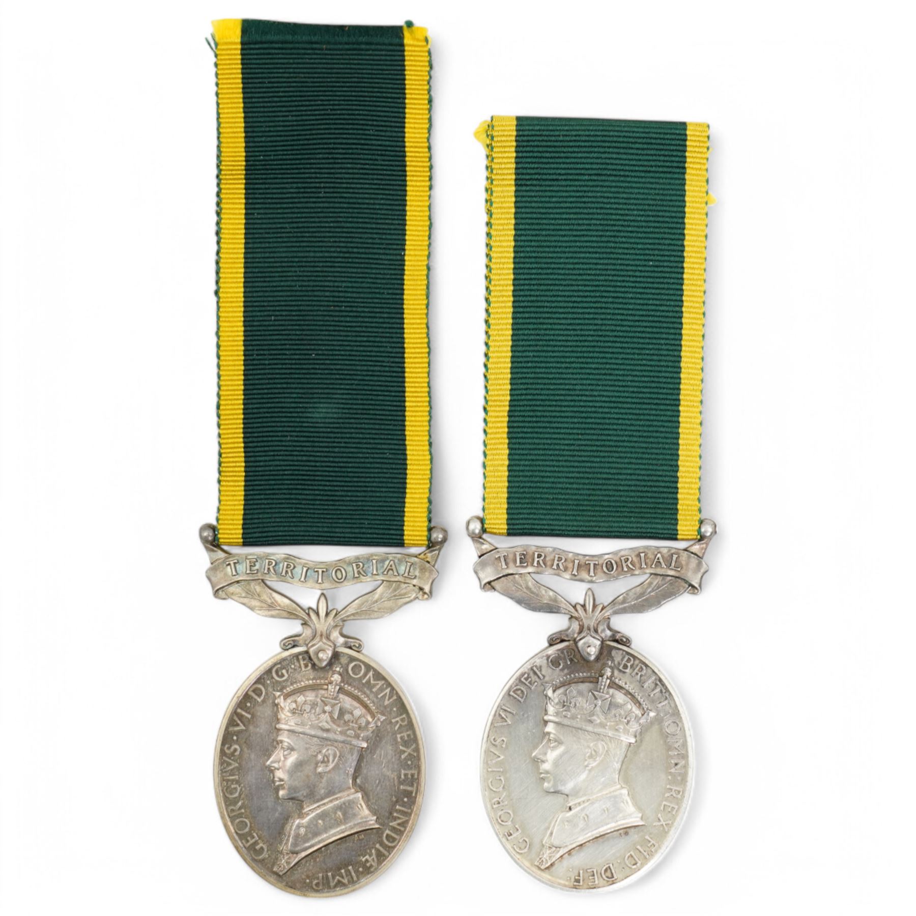 To: 3767879 Dvr H.H. Riley R.E, Territorial Efficiency Medal in box of issue and another to 4077599 Rfn. J.H.Hannam R.B.