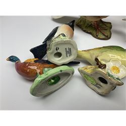 Collection twenty one of Beswick bird figures, to include Lapwing no 2416, Kingfisher no 2671, Red Pigeon 1383, Cuckoo no 2315, Nuthatch no 2418 etc