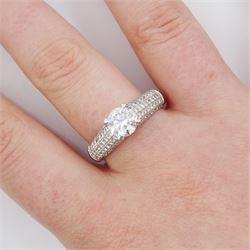 18ct white gold diamond ring, set with a single round brilliant cut diamond of approx 1.10 carat, five row pave set diamond shoulders and gallery, stamped 750, total diamond weight approx 1.50 carat