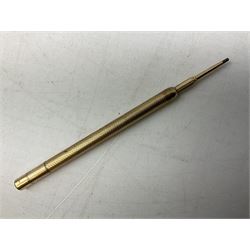 9ct gold propelling pencil with engine turned decoration and vacant cartouche, by S J Rose & Son, stamped 375, L12cm, together with a Parker 12ct rolled gold fountain pen, and two rose gold engine turned propelling pencils to include a rose gold example