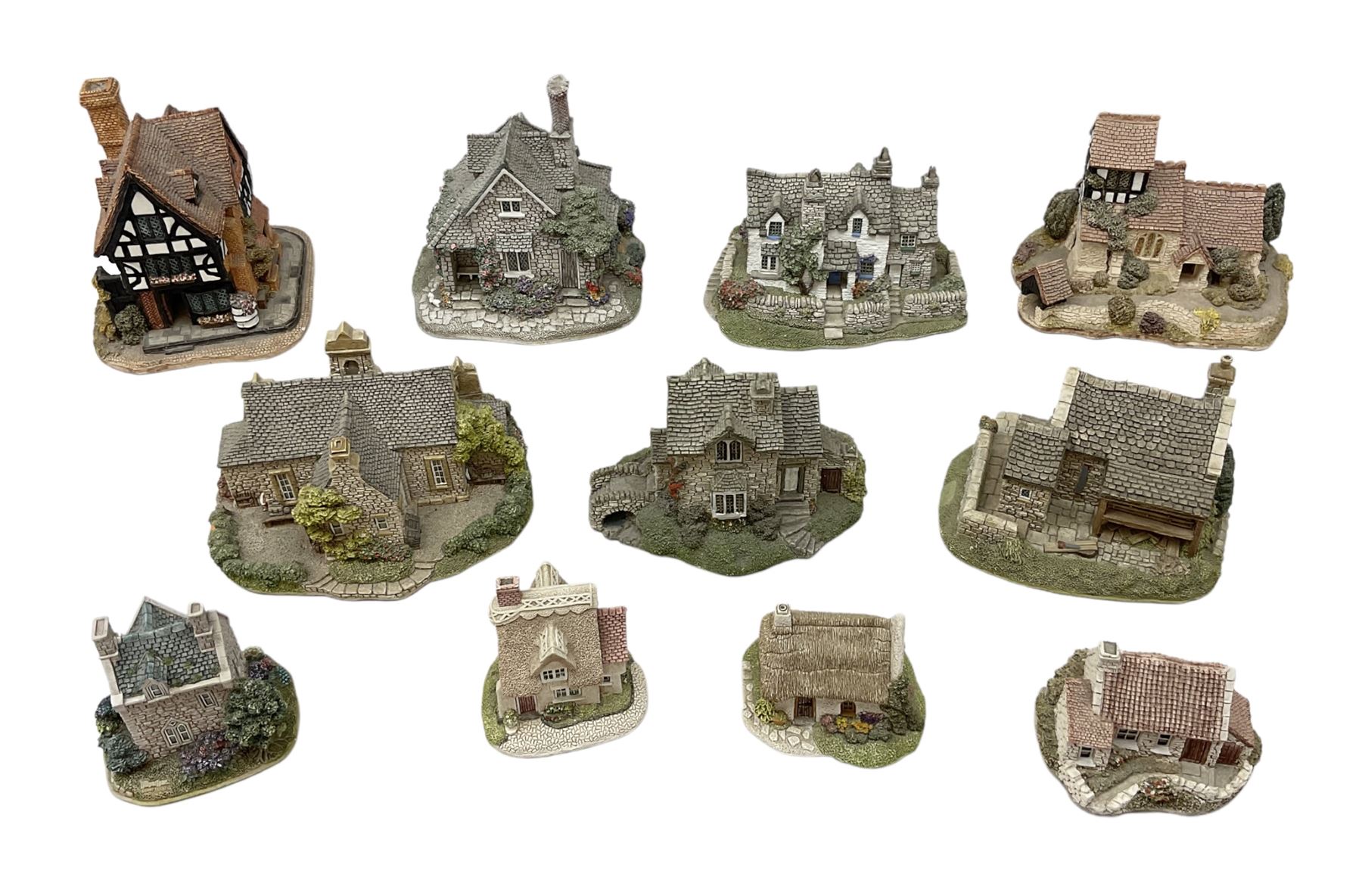 Eleven Lilliput Lane models, to include St Marks, Rose Cottage, Puffin Row, Village School, Swan Inn etc, all boxed
