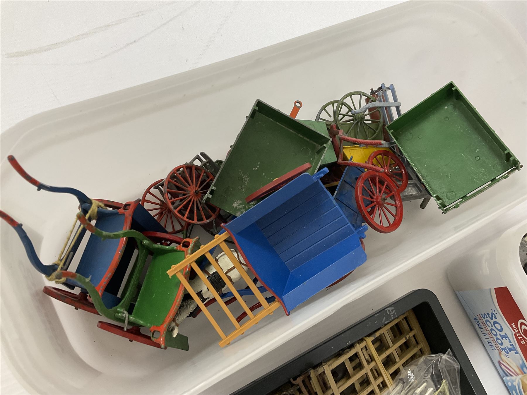 Large quantity of playworn 1950s Britains and other lead figures including farm and zoo animals, horse drawn carts, fencing etc