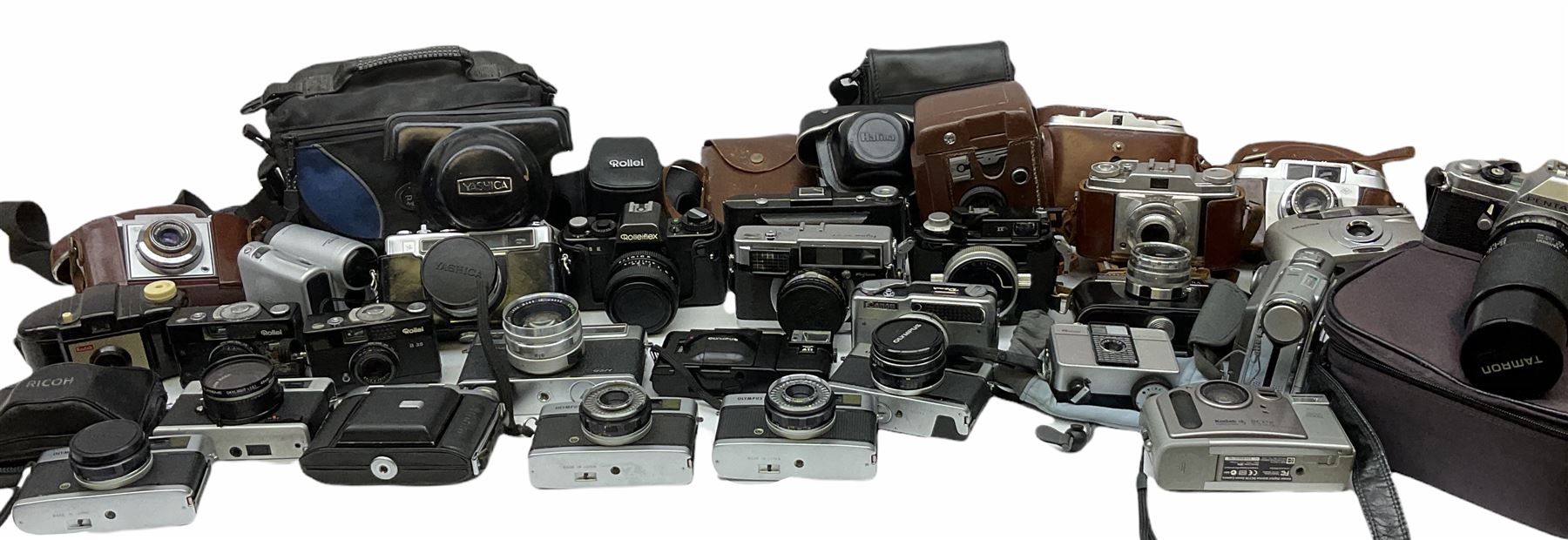 Collection of cameras, to include three Olympus Trip 35,  Balda Super Baldax, Seagull 4A TLR Camera, Pentax MG, Pentax-MV1, Yashica, two Yashica Electro 35, Rollei B35, Fujica 35 EE etc. 
