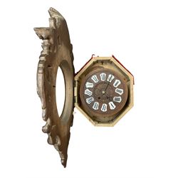 French- late 19th century carved oak wall clock c 1880, outer case with interlaced scroll carving and a carved images of fruit and wild beasts, integrated dial with porcelain cartouche Roman numerals and gothic hands, with a twin train spring driven rack striking movement striking the hours on a coiled gong.
