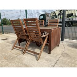 Rectangular teak drop leaf garden table, and four slatted armchairs