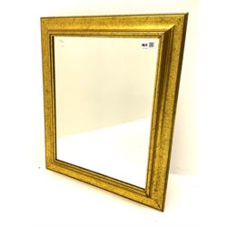 Ornate gilt framed oval wall mirror and a small rectangular wall mirror