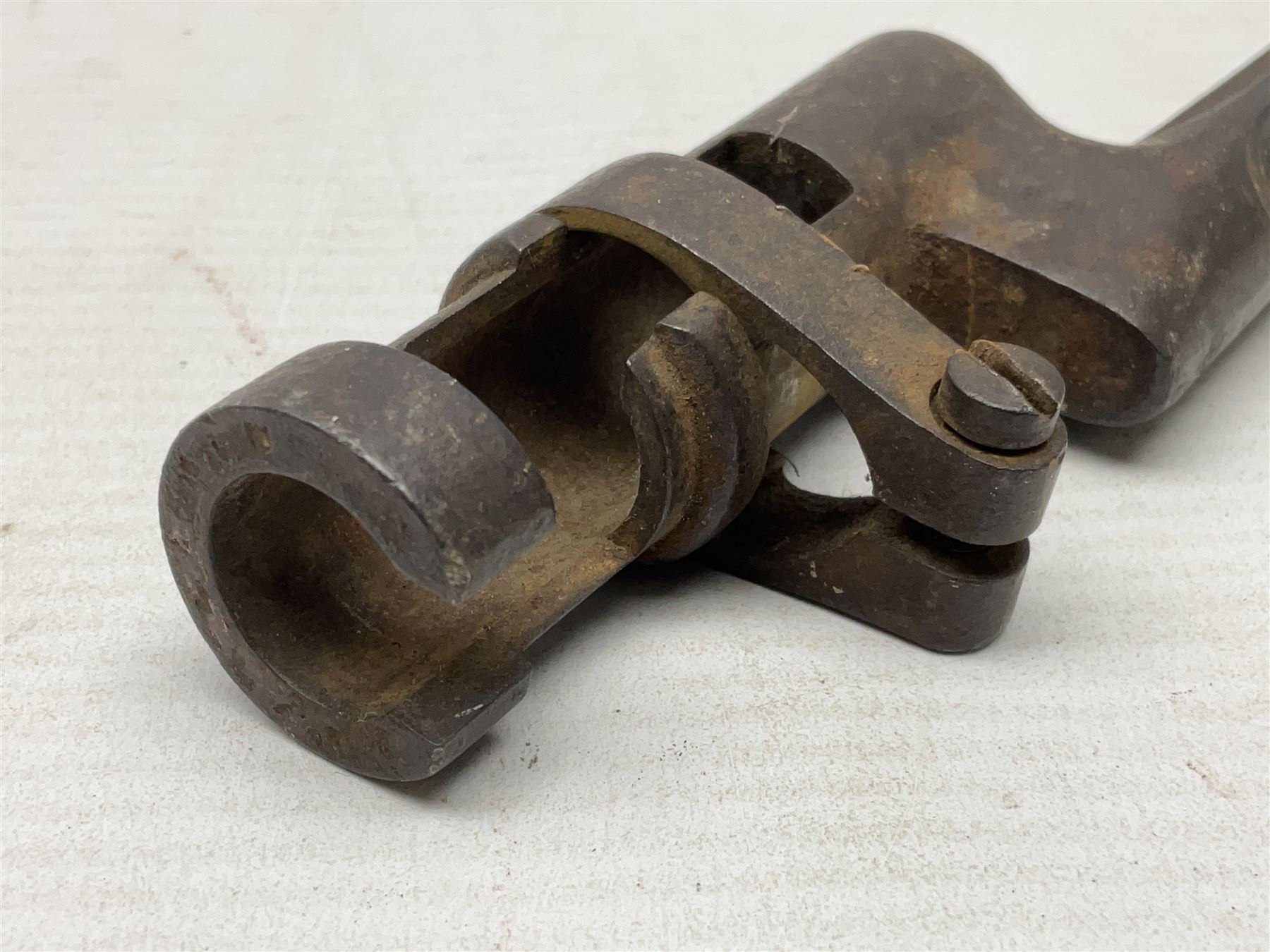 French model 1866 sabre bayonet, the 57.5cm curving blade marked St. Etienne 1873; in associated steel scabbard L71cm; and Mosin-Nagant M1891 socket bayonet with 43cm cruciform blade No.37068 (no scabbard) (2)