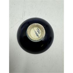 Moorcroft pewter-mounted circular ashtray decorated in Pomegranate pattern, together with Anemone pattern ashtray and trinket dish, all with makers mark beneath    