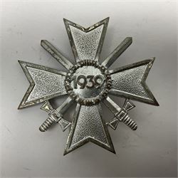 Four German awards c1957 - Knights Cross of the War Merit Cross, War Merit Cross 1st Class, Faithful Service Cross and Silver Wound badge (4)