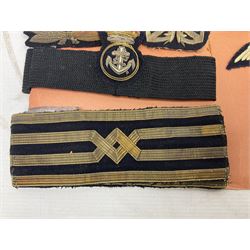 Quantity of WW1 and later Royal Navy and RAF cloth and metal badges and insignia