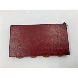 Edwardian silver mounted playing card case, hallmarked William Harrison Walter, Birmingham 1903, the sides each with a period playing card set behind a bevelled glass panel, the hinged cover with later engraving 'Presented to Norman T Crombie Esq by the officers & men of the 31st WR Detachment for services rendered 1917-1918', with red leather lined interior, the three compartments upon a sprung base and containing two later wooden Whist markers, case H12.5cm