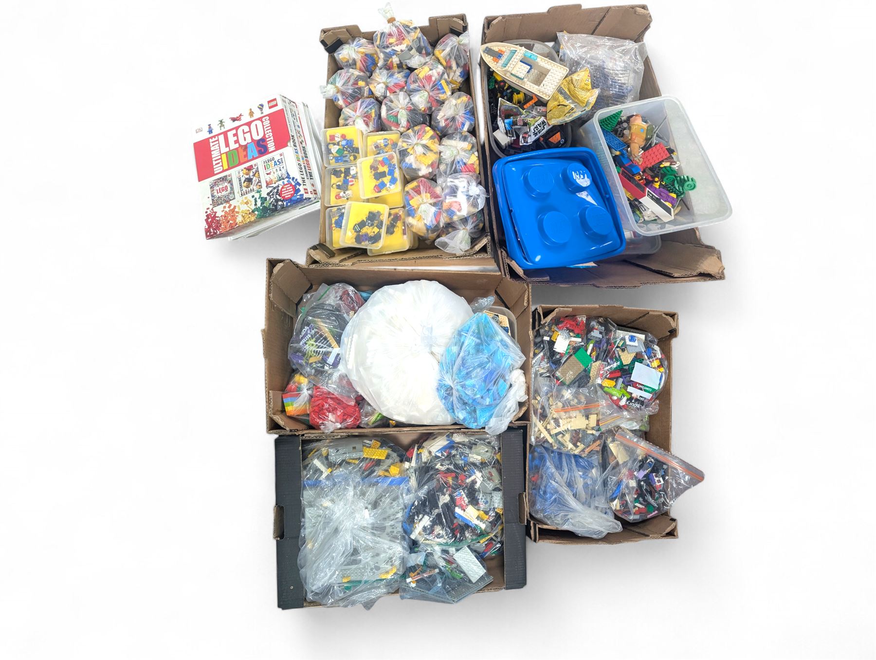 Large collection of loose Lego, including minifigures, together with three Lego ideas books, in five boxes