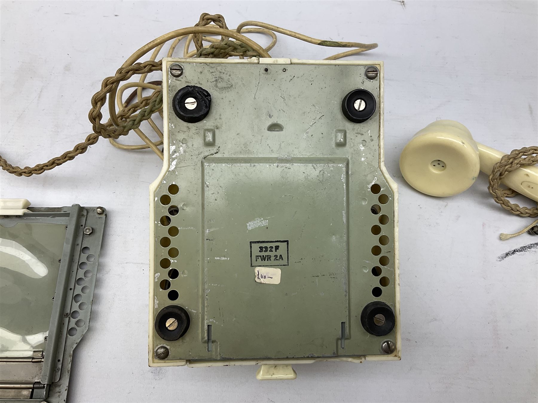 White Bakelite telephone, with alphabet dial, brown braided handset