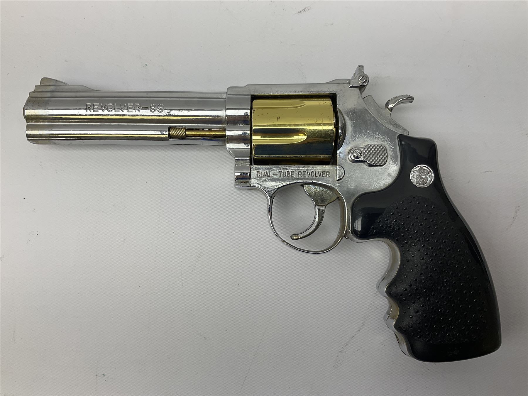 Early 20th century Flobert 5mm blank firing revolver with six-shot chamber, top venting, nickel plated with folding trigger No.118 L12.5cm overall; replica non-firing 'British Bulldog' revolver; and Windproof gas lighter inscribed 'Revolver-99 Spring and Autumn' in holster marked 'Star-Line'