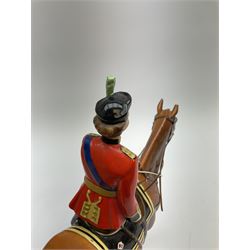 A Beswick model of HM Queen Elizabeth II mounted on Imperial Trooping the colour 1957, model no 1546, H26.5cm.