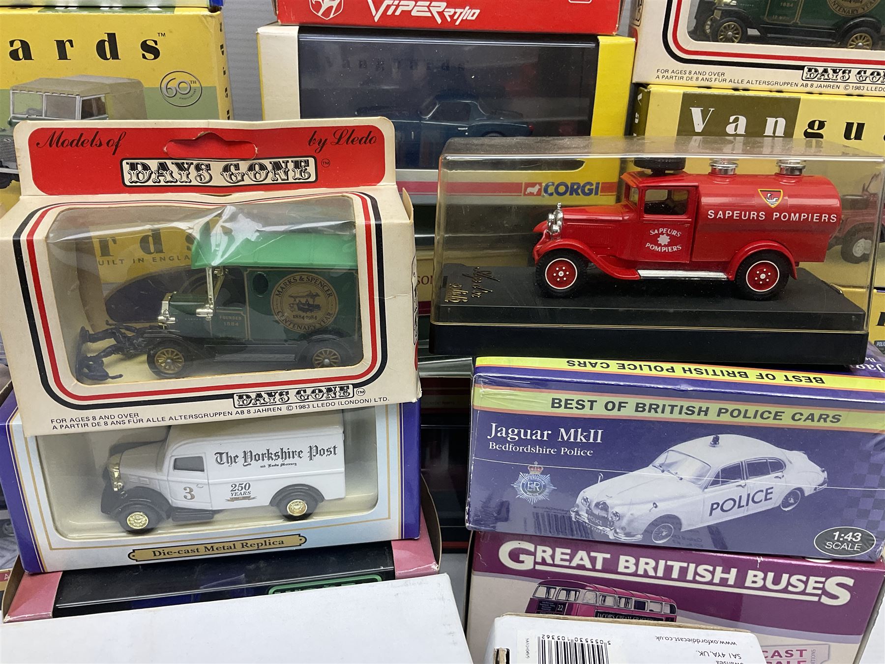 Eight Vanguards die-cast models by Corgi, Hornby and Lledo including Land Rovers, Ford Anglia and Triumph; together with thirteen other modern die-cast models by Bburago, Oxford, Atlas, EFE, Solido etc; all boxed; and small quantity of unboxed and playworn models
