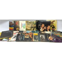 A collection of vinyl records, to include The best of Donna Summer live and more, Madness presents The Rise & Fall, Beegees Here at last Live, Electric Light Orchestra A New World Record, Electric Light Orchestra Discover, Pink Floyd Atom Heart Mother, Pink Floyd Ummagumma, etc. 