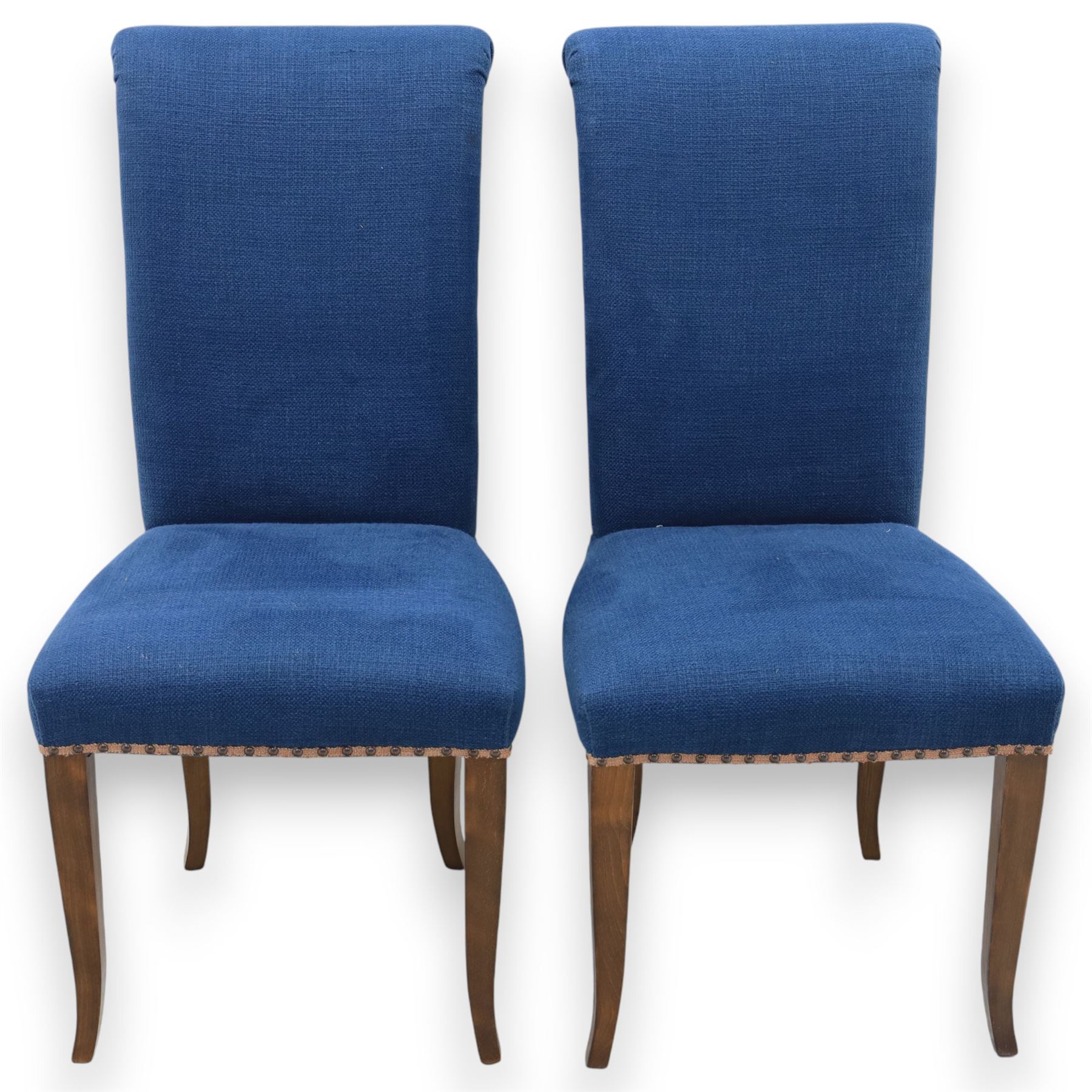 Contemporary set of four blue high back upholstered dining chairs