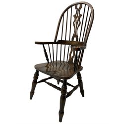 Stained beech Windsor armchair, double hoop and stick back with shaped and pieced splat back, on turned supports united by double swell-turned H stretchers